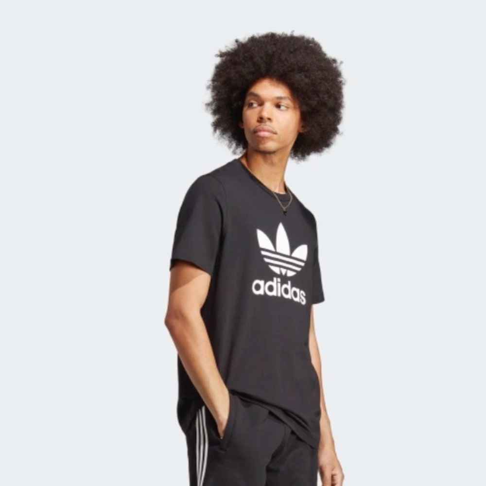 Black large Tshirt NEW IN BAG NEVER OPEN